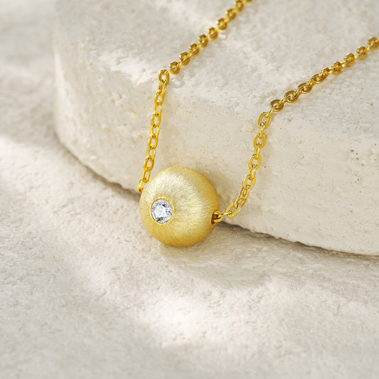 Gold-Tone Textured Sphere Necklace with Clear Stone - View 1 - Smonu